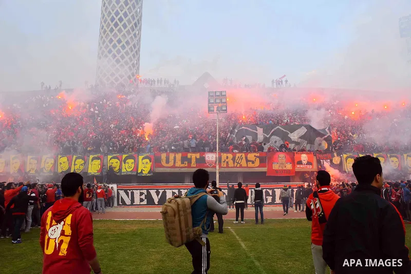 Al Ahly fans, also known as "Ultras", light flares and shout slogans at al-Ahly club's training stadium marking the fourt anniversary of killing al-Ahly fans in what known as the "Port Said massacre", on February 1, 2016...