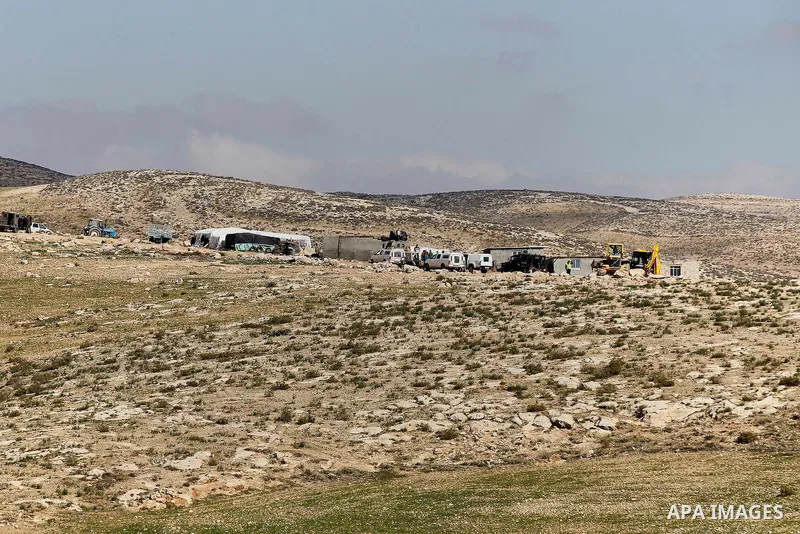 A general view shows the village of Khirbet Jenbah after several homes were demolished by Israeli bulldozers in a disputed military zone in the area of Musafir Jenbah, which includes several villages, south of the West B...