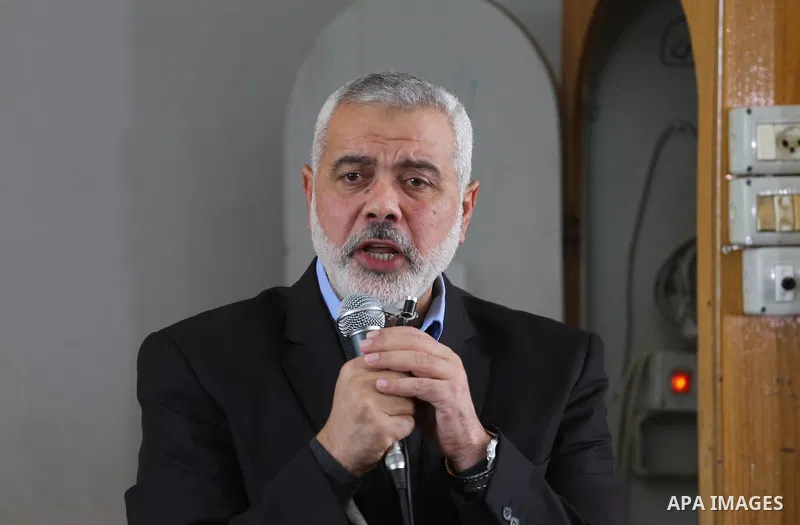 Senior Hamas leader Ismail Haniyeh speaks during the funeral of Palestinian Hamas militants whom killed when a tunnel collapse on Tuesday, during his funeral in the village of Al-Moghraga near central Gaza Strip, Februar...