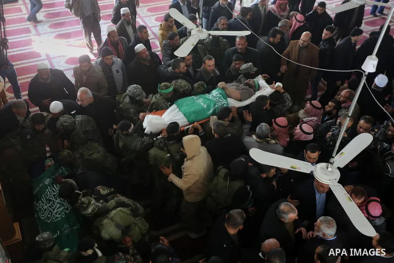 Palestinian militants carry the body of their comrade Ahmed al-Zahar, who was killed when a tunnel collapse on Tuesday, during his funeral in the village of Al-Moghraga near central Gaza Strip, February 3, 2016. The coll...