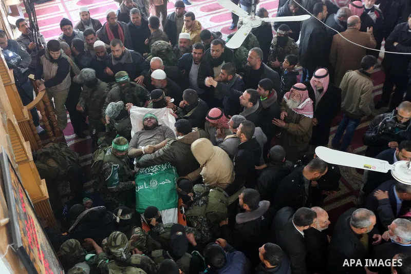 Palestinian militants carry the body of their comrade Ahmed al-Zahar, who was killed when a tunnel collapse on Tuesday, during his funeral in the village of Al-Moghraga near central Gaza Strip, February 3, 2016. The coll...