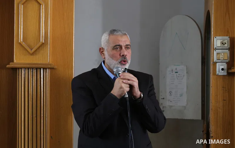 Senior Hamas leader Ismail Haniyeh speaks during the funeral of Palestinian Hamas militants whom killed when a tunnel collapse on Tuesday, during his funeral in the village of Al-Moghraga near central Gaza Strip, Februar...