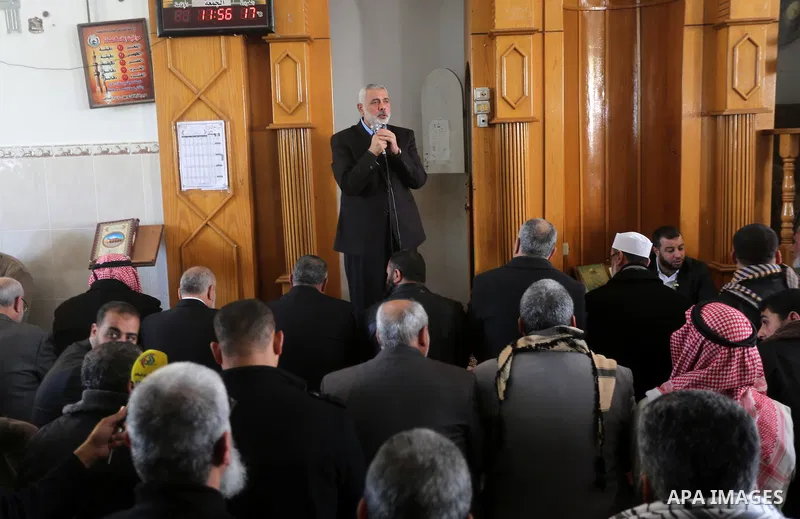 Senior Hamas leader Ismail Haniyeh speaks during the funeral of Palestinian Hamas militants whom killed when a tunnel collapse on Tuesday, during his funeral in the village of Al-Moghraga near central Gaza Strip, Februar...
