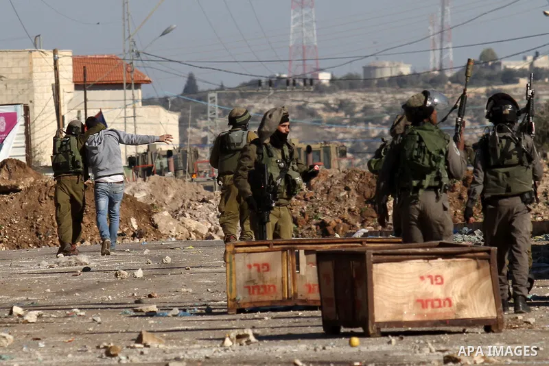 Israeli security forces detain a Palestinian protester during clashes in Qabatiya, a town near Jenin in the north of the Israeli-occupied West Bank, on February 4, 2016. Israeli forces locked down Qabatiya that was home...