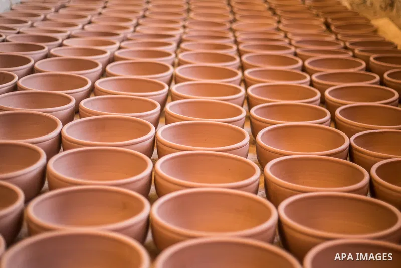 Pottery vessels are seen drying at a pottery workshop in Cairo, on February 6, 2016. Pottery is an ancient and traditional craft in Gaza. Local workshops usually produce products such as bowls, pitchers, flower pots, and...