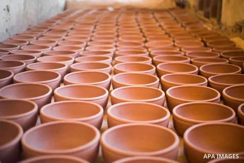 Pottery vessels are seen drying at a pottery workshop in Cairo, on February 6, 2016. Pottery is an ancient and traditional craft in Gaza. Local workshops usually produce products such as bowls, pitchers, flower pots, and...