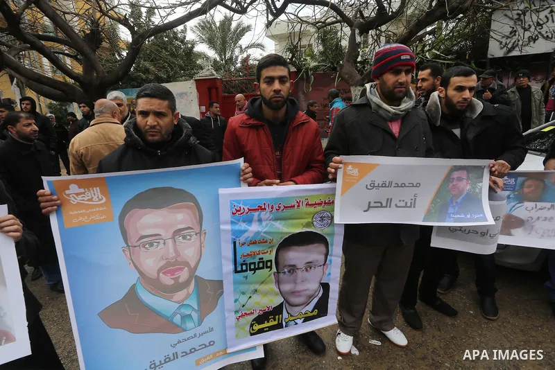 Palestinians take part in a protest demanding release the prisoners in Israeli jails, in front of Red cross office, in Gaza city, on February 8, 2016. Photo by Mohammed Asad