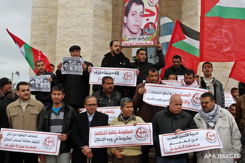 Palestinian supporters of Popular front for Liberation of Palestine (PFLP) take part in a protest in solidarity with Palestinian in the occupied West Bank and Jerusalem, in Rafah in the southern of Gaza strip on Feb. 08,...