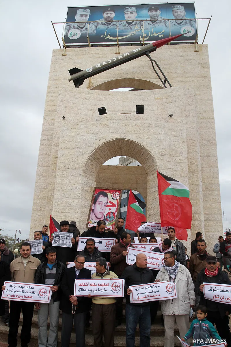 Palestinian supporters of Popular front for Liberation of Palestine (PFLP) take part in a protest in solidarity with Palestinian in the occupied West Bank and Jerusalem, in Rafah in the southern of Gaza strip on Feb. 08,...