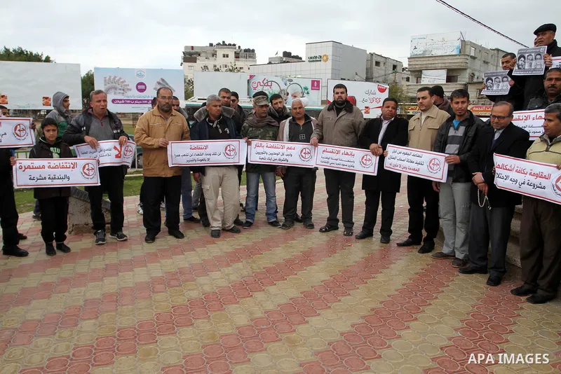 Palestinian supporters of Popular front for Liberation of Palestine (PFLP) take part in a protest in solidarity with Palestinian in the occupied West Bank and Jerusalem, in Rafah in the southern of Gaza strip on Feb. 08,...
