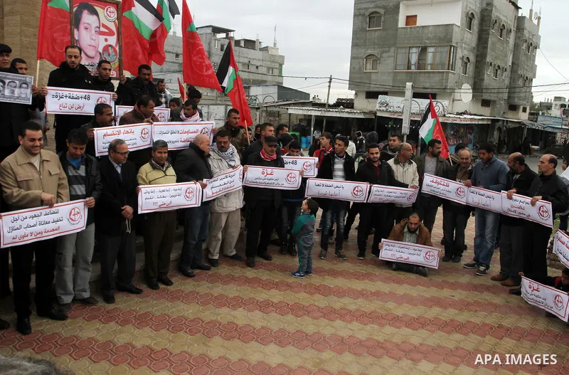 Palestinian supporters of Popular front for Liberation of Palestine (PFLP) take part in a protest in solidarity with Palestinian in the occupied West Bank and Jerusalem, in Rafah in the southern of Gaza strip on Feb. 08,...