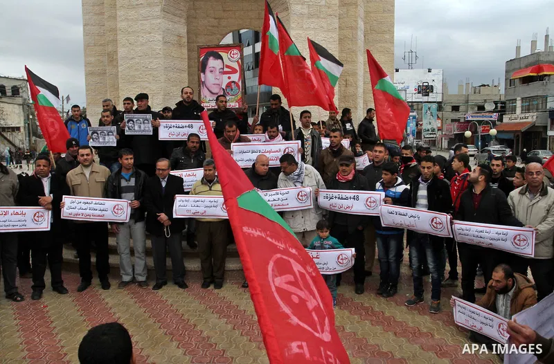 Palestinian supporters of Popular front for Liberation of Palestine (PFLP) take part in a protest in solidarity with Palestinian in the occupied West Bank and Jerusalem, in Rafah in the southern of Gaza strip on Feb. 08,...