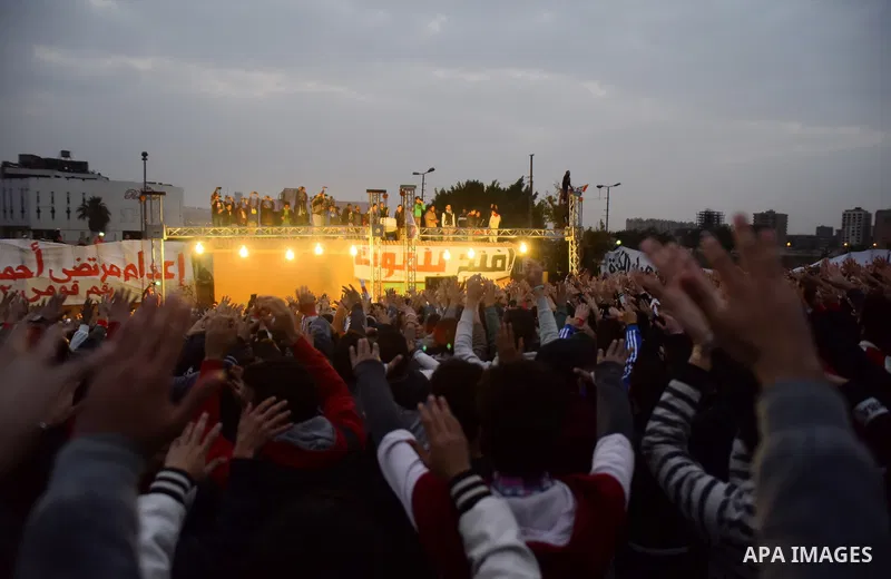 Al-Zamalek soccer club fans known as 'Ultras White Knights" light flares and shout slogans to mark the first anniversary of killing al-Zamalek fans in Cairo, Egypt, Feb. 08, 2016. At least 22 soccer fans were crushed to...