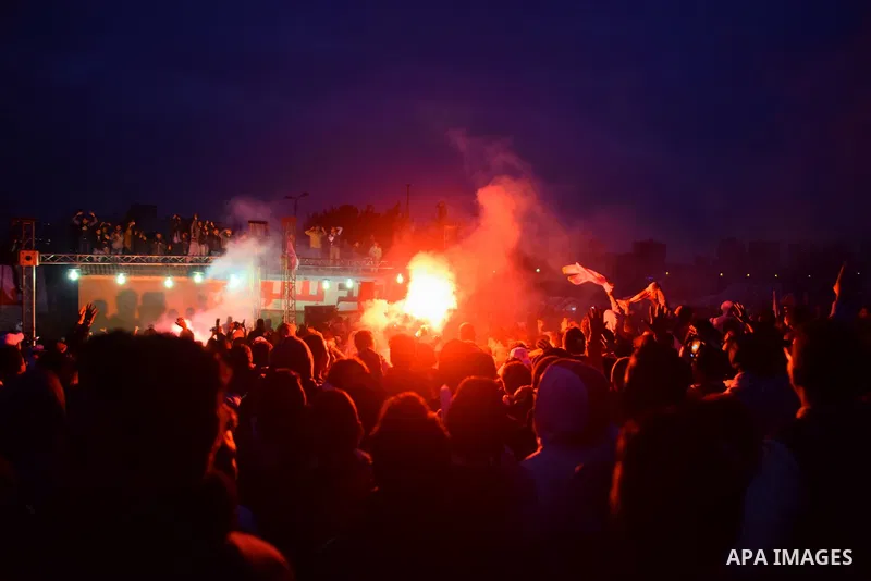 Al-Zamalek soccer club fans known as 'Ultras White Knights" light flares and shout slogans to mark the first anniversary of killing al-Zamalek fans in Cairo, Egypt, Feb. 08, 2016. At least 22 soccer fans were crushed to...