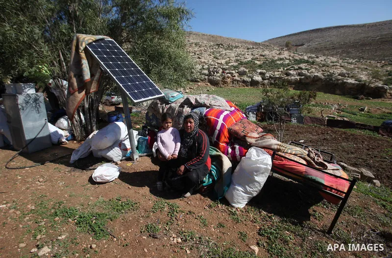 Palestinians inspect the rubble of a house that was demolished after Israeli authorities said it was built without a permit at Kherbet Tana, eastern the West Bank city of Nablus, on February 9, 2016. Photo by Nedal Eshta...