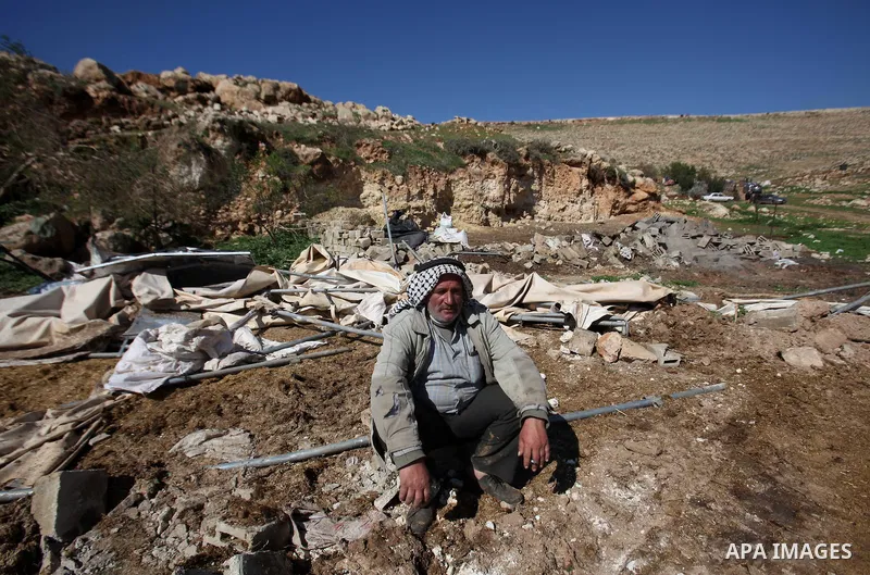 Palestinians inspect the rubble of a house that was demolished after Israeli authorities said it was built without a permit at Kherbet Tana, eastern the West Bank city of Nablus, on February 9, 2016. Photo by Nedal Eshta...