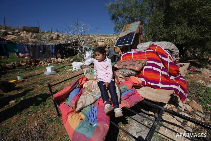 Palestinians inspect the rubble of a house that was demolished after Israeli authorities said it was built without a permit at Kherbet Tana, eastern the West Bank city of Nablus, on February 9, 2016. Photo by Nedal Eshta...