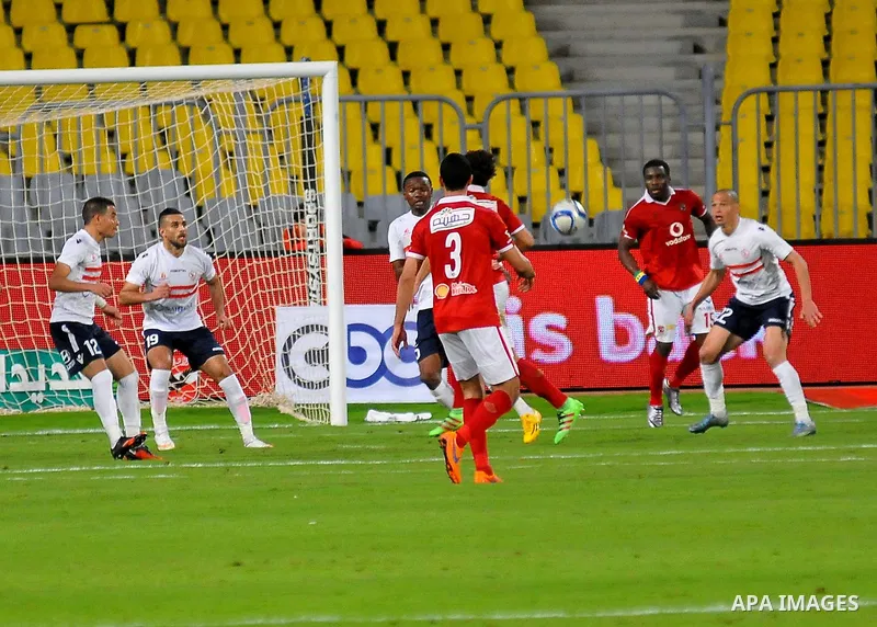 Al Ahly players compete against with Zamalek players during their Egyptian Premier League derby soccer match at Borg El Arab "Army Stadium" near Alexandria, Egypt, February 9, 2016. Photo by Amr Sayed