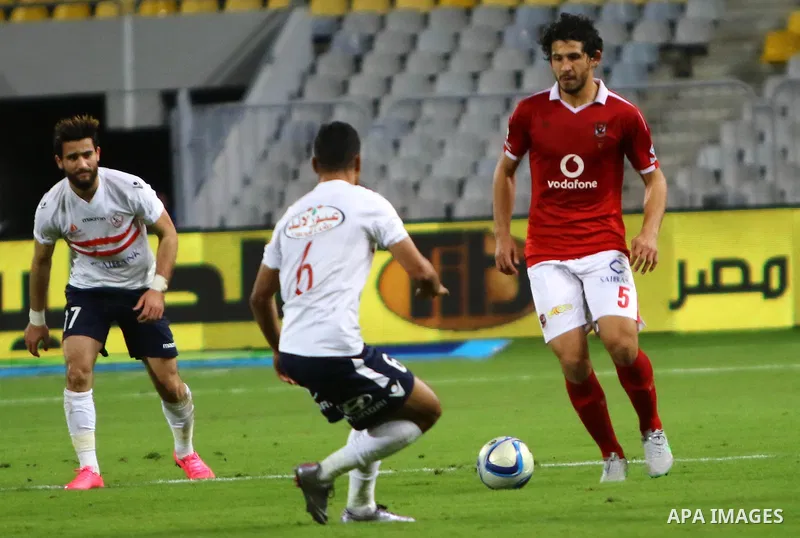 Al Ahly players compete against with Zamalek players during their Egyptian Premier League derby soccer match at Borg El Arab "Army Stadium" near Alexandria, Egypt, February 9, 2016. Photo by Amr Sayed