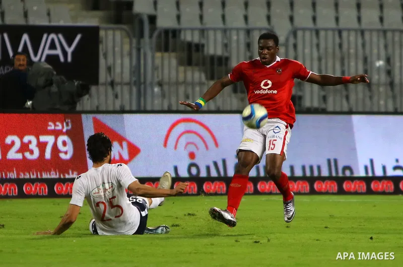 Al Ahly players compete against with Zamalek players during their Egyptian Premier League derby soccer match at Borg El Arab "Army Stadium" near Alexandria, Egypt, February 9, 2016. Photo by Amr Sayed