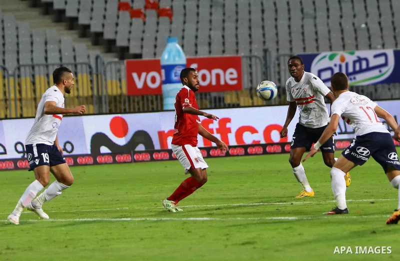 Al Ahly players compete against with Zamalek players during their Egyptian Premier League derby soccer match at Borg El Arab "Army Stadium" near Alexandria, Egypt, February 9, 2016. Photo by Amr Sayed