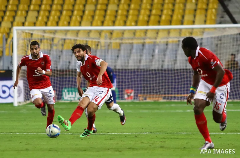 Al Ahly players compete against with Zamalek players during their Egyptian Premier League derby soccer match at Borg El Arab "Army Stadium" near Alexandria, Egypt, February 9, 2016. Photo by Amr Sayed