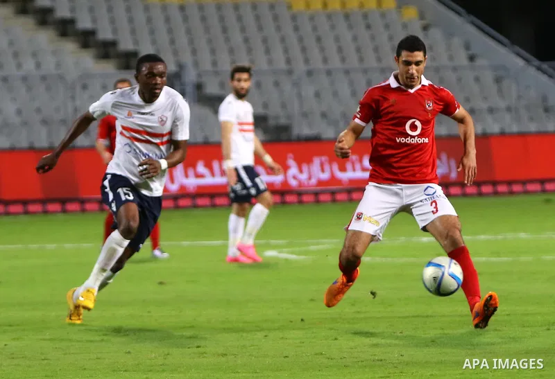 Al Ahly players compete against with Zamalek players during their Egyptian Premier League derby soccer match at Borg El Arab "Army Stadium" near Alexandria, Egypt, February 9, 2016. Photo by Amr Sayed