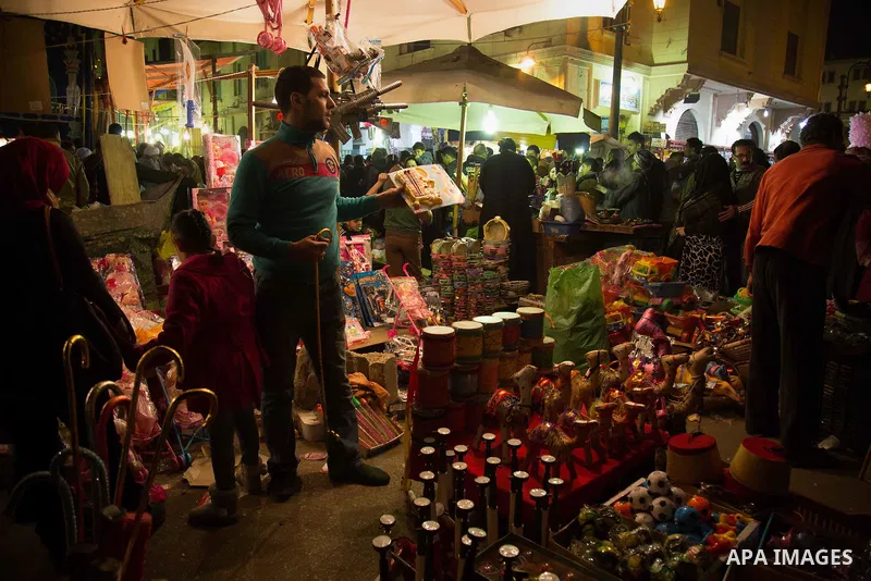 Egyptians celebrate Moulid al-Hussein, a Sufi gathering which commemorates the birth of the Muslim Prophet Muhammad's grandson, in Cairo, Egypt. The event attracts thousands of Muslims from all over the country to the mo...