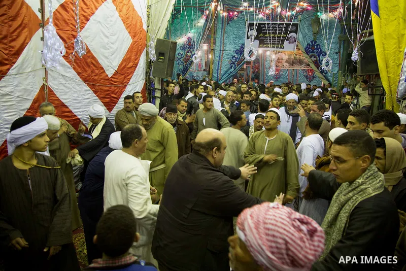Egyptians celebrate Moulid al-Hussein, a Sufi gathering which commemorates the birth of the Muslim Prophet Muhammad's grandson, in Cairo, Egypt. The event attracts thousands of Muslims from all over the country to the mo...
