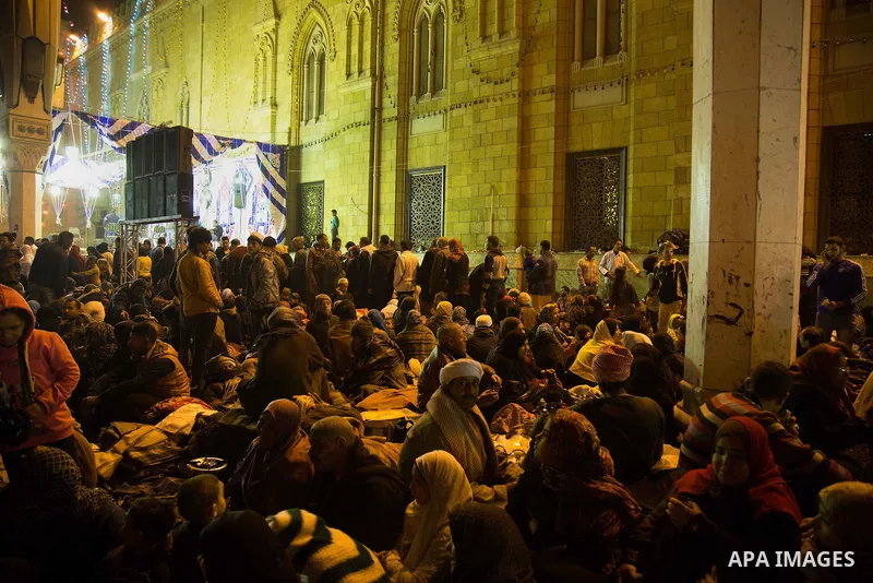 Egyptians celebrate Moulid al-Hussein, a Sufi gathering which commemorates the birth of the Muslim Prophet Muhammad's grandson, in Cairo, Egypt. The event attracts thousands of Muslims from all over the country to the mo...