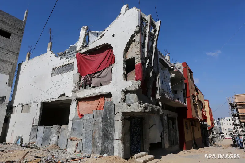 A residential building, that was heavily destroyed during 2014 war, in Shijaiyah neighborhood in the east of Gaza city on Feb. 11, 2016. Rebuilding of Palestinian houses which destroyed during 2014 war and funded by Kuwa...