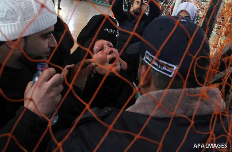 Palestinians await permission to enter Egypt as they gather at the Rafah border crossing in the southern Gaza Strip on February 13, 2016. The Gaza Strip's border crossing with Egypt at Rafah is set to reopen for two days...