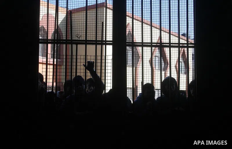 Palestinians await permission to enter Egypt as they gather at the Rafah border crossing in the southern Gaza Strip on February 13, 2016. The Gaza Strip's border crossing with Egypt at Rafah is set to reopen for two days...