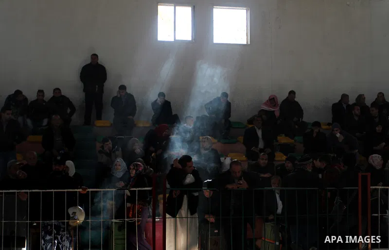 Palestinians await permission to enter Egypt as they gather at the Rafah border crossing in the southern Gaza Strip on February 13, 2016. The Gaza Strip's border crossing with Egypt at Rafah is set to reopen for two days...