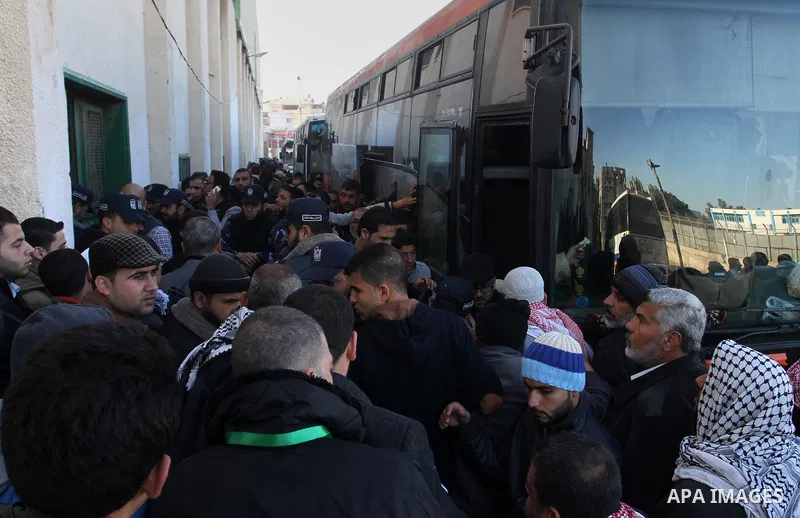 Palestinians await permission to enter Egypt as they gather at the Rafah border crossing in the southern Gaza Strip on February 13, 2016. The Gaza Strip's border crossing with Egypt at Rafah is set to reopen for two days...