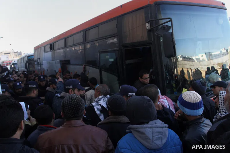 Palestinians await permission to enter Egypt as they gather at the Rafah border crossing in the southern Gaza Strip on February 13, 2016. The Gaza Strip's border crossing with Egypt at Rafah is set to reopen for two days...
