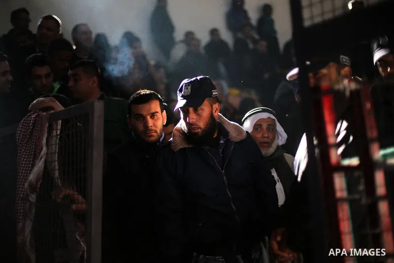 Palestinians await permission to enter Egypt as they gather at the Rafah border crossing in the southern Gaza Strip on February 13, 2016. The Gaza Strip's border crossing with Egypt at Rafah is set to reopen for two days...