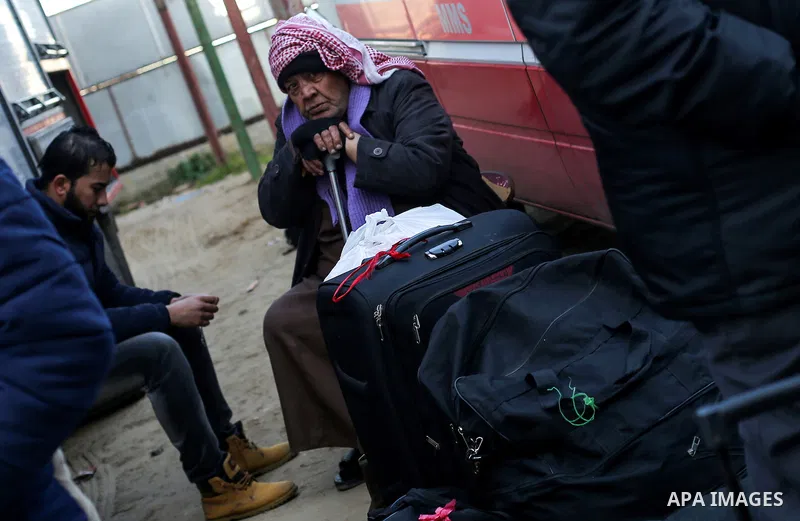 Palestinians await permission to enter Egypt as they gather at the Rafah border crossing in the southern Gaza Strip on February 13, 2016. The Gaza Strip's border crossing with Egypt at Rafah is set to reopen for two days...