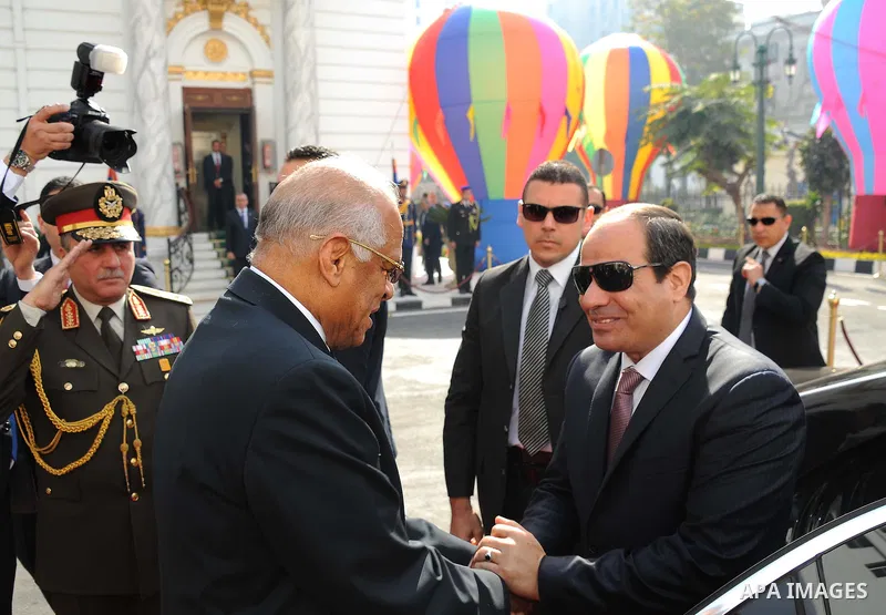 A handout picture released by the Egyptian Presidency on February 13, 2016 shows Egyptian President Abdel Fattah al-Sisi, visits the parliament headquarters in Cairo. Photo by Egyptian President Office