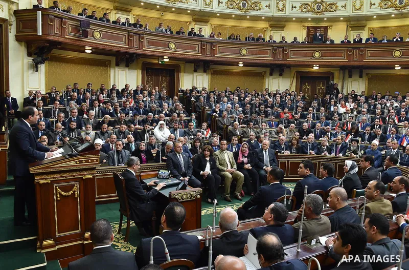 A handout picture released by the Egyptian Presidency on February 13, 2016 shows Egyptian President Abdel Fattah al-Sisi giving a speech during his visit to the parliament headquarters in Cairo. Photo by Egyptian Preside...