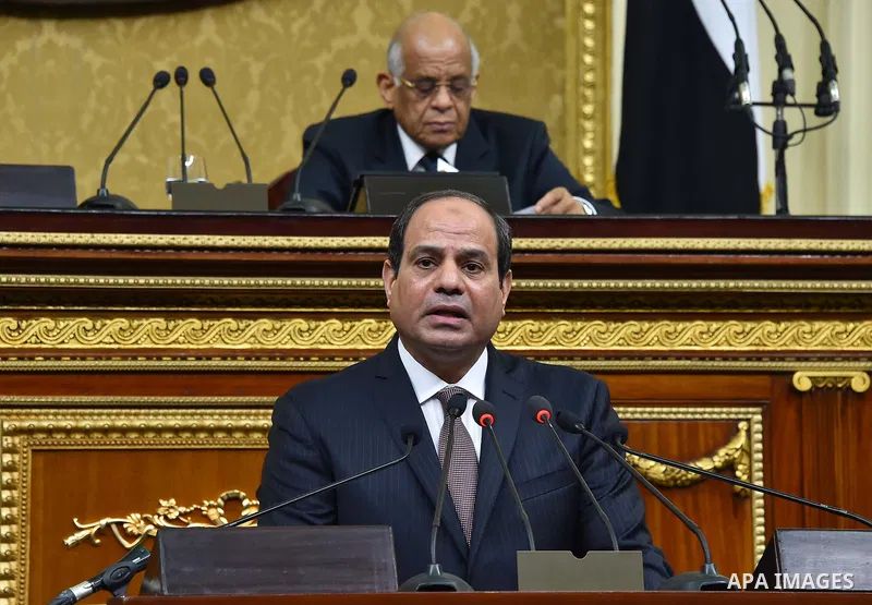 A handout picture released by the Egyptian Presidency on February 13, 2016 shows Egyptian President Abdel Fattah al-Sisi giving a speech during his visit to the parliament headquarters in Cairo. Photo by Egyptian Preside...