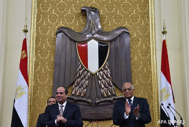 A handout picture released by the Egyptian Presidency on February 13, 2016 shows Egyptian President Abdel Fattah al-Sisi giving a speech during his visit to the parliament headquarters in Cairo. Photo by Egyptian Preside...