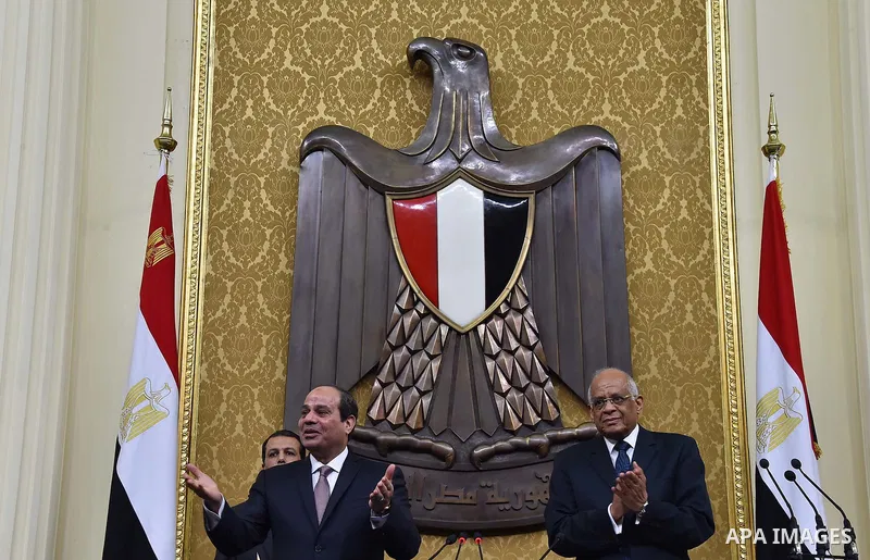 A handout picture released by the Egyptian Presidency on February 13, 2016 shows Egyptian President Abdel Fattah al-Sisi giving a speech during his visit to the parliament headquarters in Cairo. Photo by Egyptian Preside...