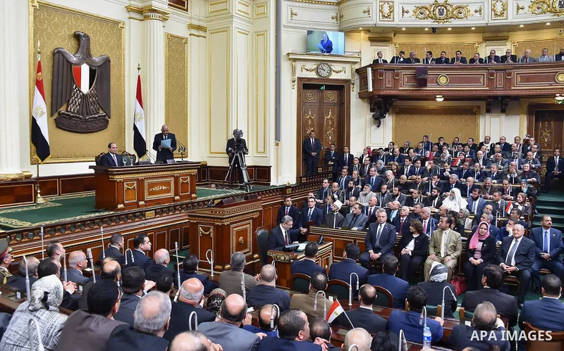 A handout picture released by the Egyptian Presidency on February 13, 2016 shows Egyptian President Abdel Fattah al-Sisi giving a speech during his visit to the parliament headquarters in Cairo. Photo by Egyptian Preside...