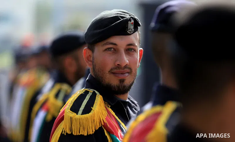 Palestinian police attend a ceremony of the harvest of police work for the 2015, in Gaza city on February 13, 2016. Photo by Yasser Qudih