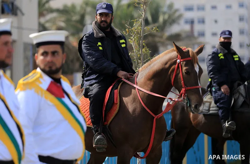 Palestinian police attend a ceremony of the harvest of police work for the 2015, in Gaza city on February 13, 2016. Photo by Yasser Qudih