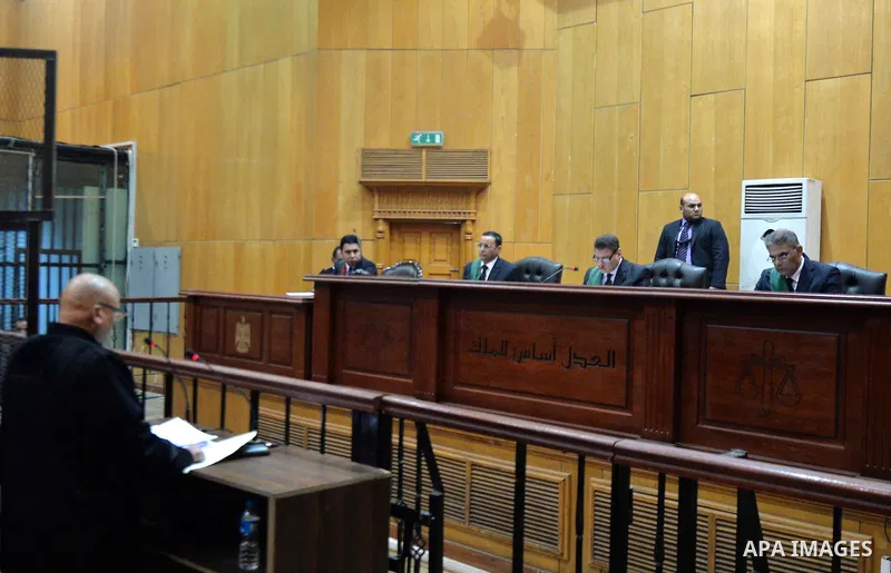 An Egyptian Judge attends the trial of ousted Egyptian president Mohammed Morsi, during the 'Qatar espionage' case, in a court in Cairo on Feb. 13, 2016. The defendants are accused of 'leaking important national security...
