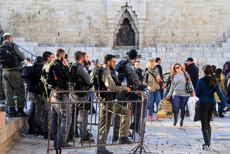 Israeli border policemen stand guard at Damascus Gate, a main entrance to Jerusalem's Old City on February 13, 2016. Photo by Mahfouz Abu Turk