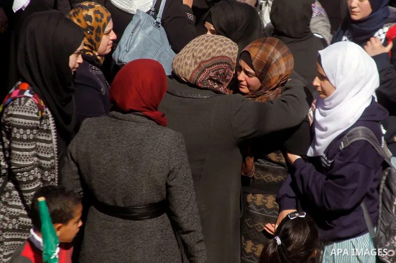 The relatives of Palestinian Kalzar al-Uweiwi, a Palestinian teenager who was killed a day earlier following a reported stabbing attack, mourn during her funeral, in the West Bank city of Hebron, February 14, 2016. Israe...