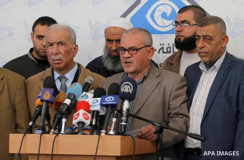 Head of associations of Hajj and Umrah, Awad Madkour, speaks during a press conference, in Gaza city on February 14, 2016. Photo by Mohammed Asad
